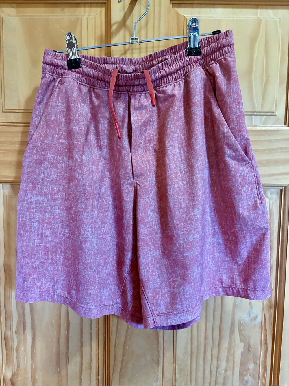 Men's 7” Lululemon Pace Breaker Linerless Short in Heathered Red